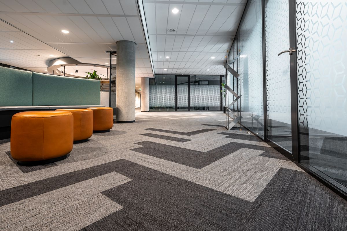 Illustrative office interior with patterned commercial carpet